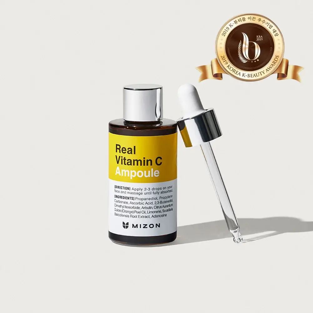 MIZON Real Vitamin C Ampoule con pipetta. Etichetta gialla, flacone marrone, tappo argentato. Korea K-Beauty Awards.