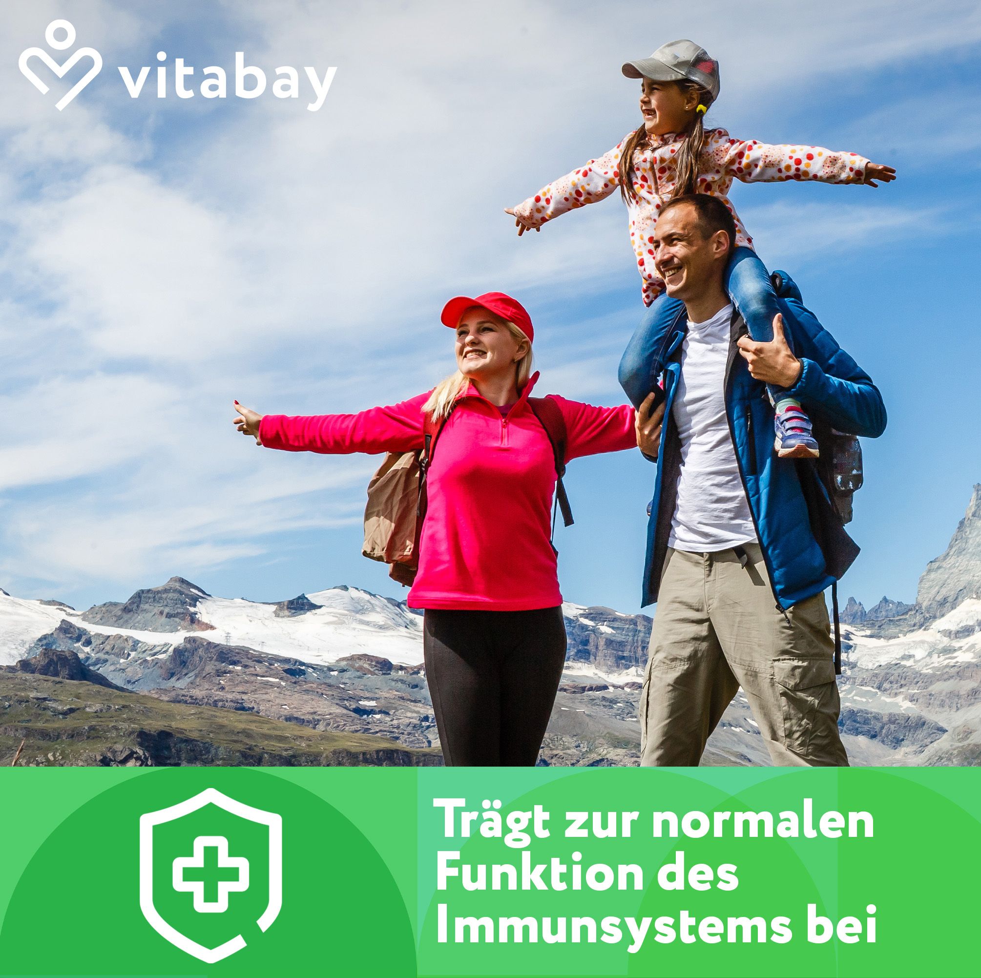 Famiglia in montagna. Bambino sulle spalle. Testo: Contribuisce alla normale funzione del sistema immunitario.