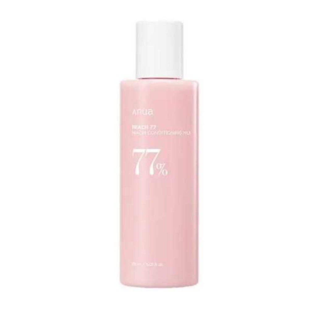 Flacone rosa con tappo bianco, scritta 'ANUA Peach 77 Niacin Conditioning Milk'.