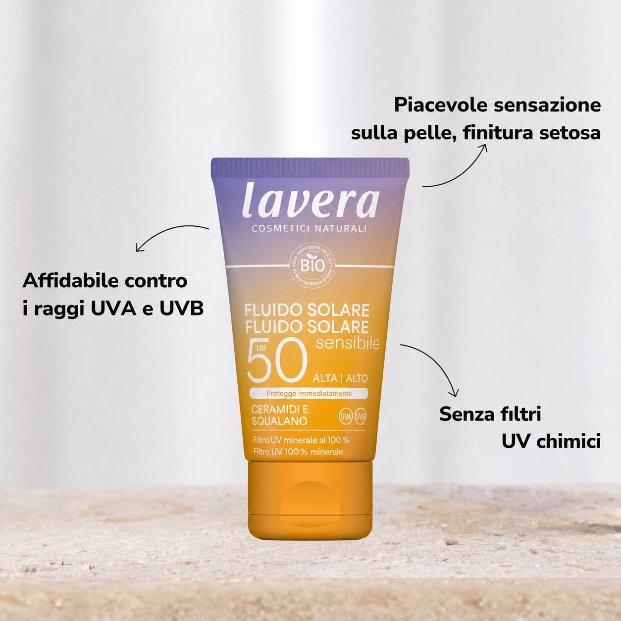 Fluido solare LSF 50 lavera. Tubo con informazioni sul prodotto. Testo: protezione UVA/UVB, senza filtri UV chimici.