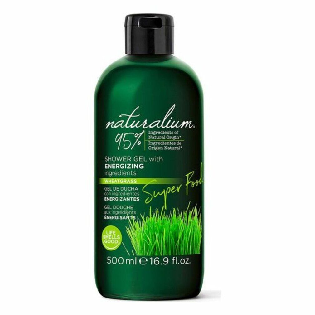 Flacone verde con tappo nero. Scritta: Naturalium, 95%, gel doccia energizzante al grano. 500 ml.