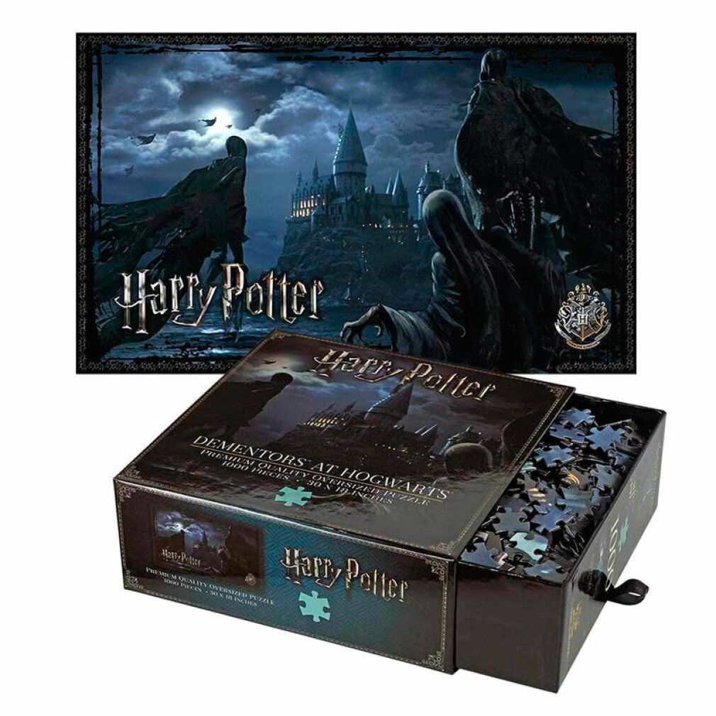 Puzzle di Harry Potter. Scatola aperta con pezzi e immagine finita. Scritta: Dementors at Hogwarts, 1000 pezzi.