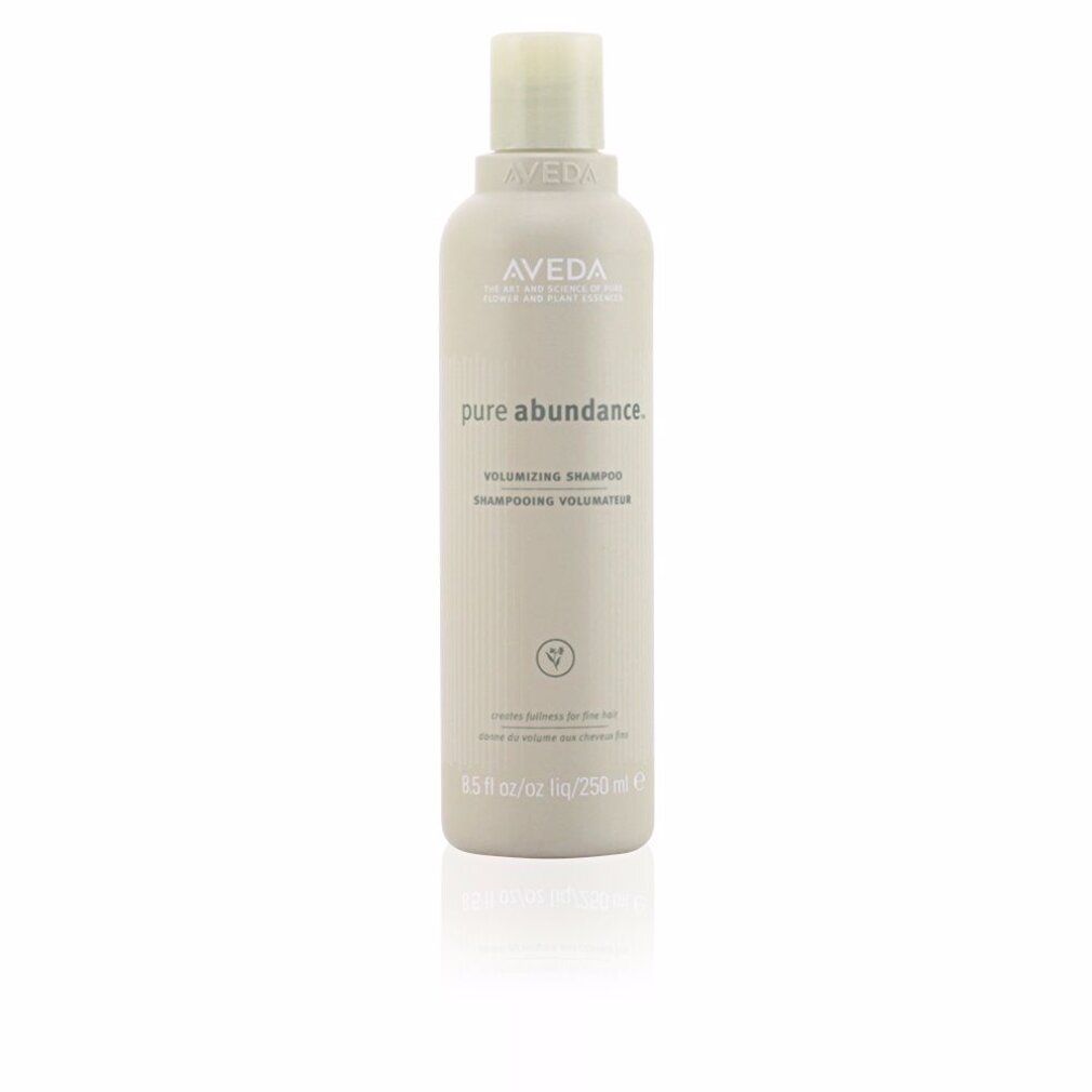 Flacone di shampoo beige. Scritta: Aveda, Pure Abundance, Volumizing Shampoo. 250 ml.