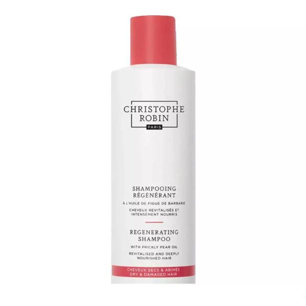 Flacone di shampoo bianco con tappo rosso. Testo: Christophe Robin, Shampooing Régénérant, Regenerating Shampoo. Per capelli secchi e danneggiati.