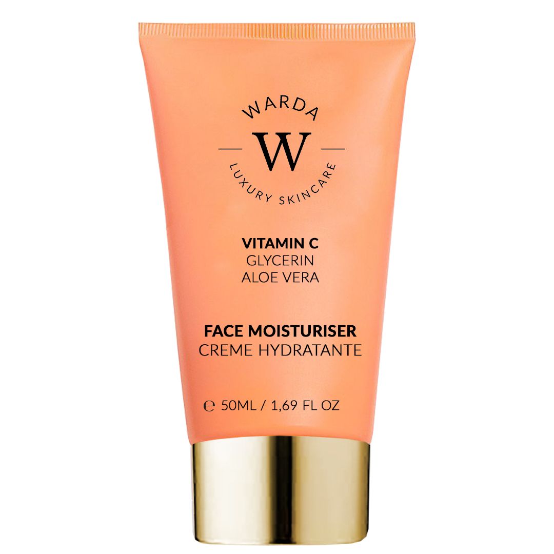 Tubo arancione Warda SKIN GLOW BOOST Vitamin C. Contiene Vitamina C, Glicerina, Aloe Vera. Crema idratante viso. 50ml.