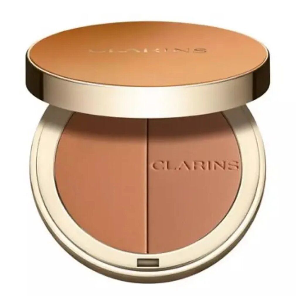 Cipria bronzante compatta rotonda con due tonalità. Coperchio e polvere nei toni del marrone e dell'oro. Marchio Clarins.