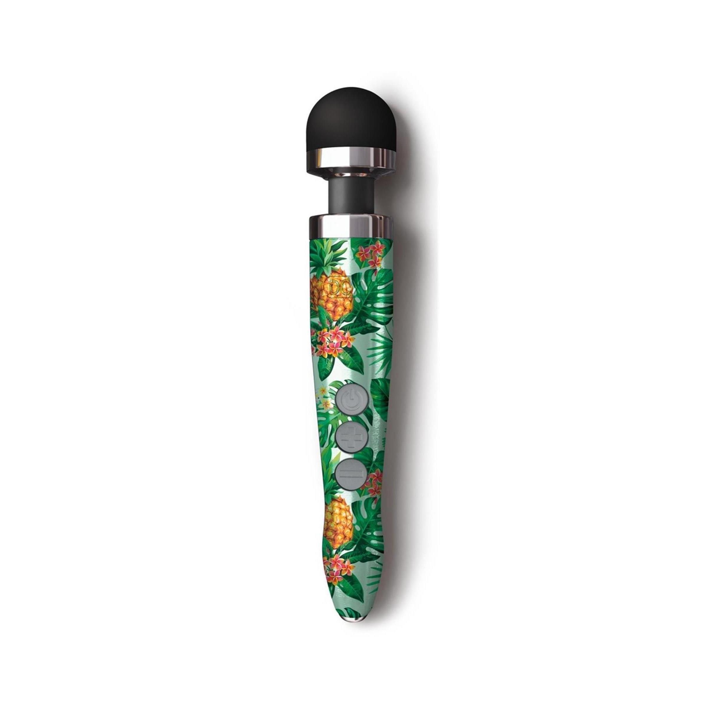 Vibratore con testa nera e manico verde con motivo ananas e foglie. Tre pulsanti. Anello metallico.
