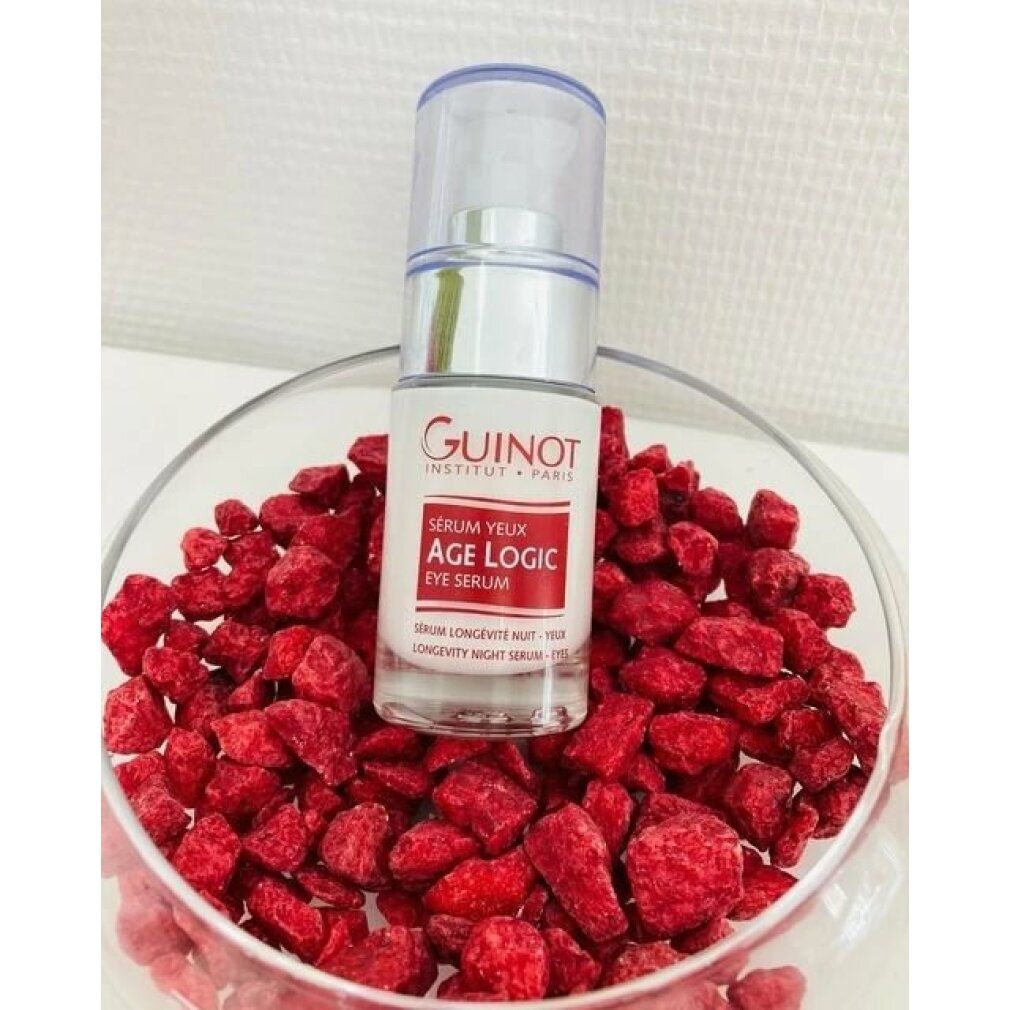 Flacone di siero con dosatore in una ciotola di bacche rosse. Scritta: Guinot, Age Logic, Eye Serum.