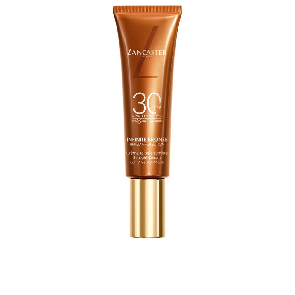 Tubo marrone con tappo dorato. Logo "Lancaster", "SPF 30", "Infinite Bronze" e nome del prodotto. Scritta: Crème Teintée Lumière.