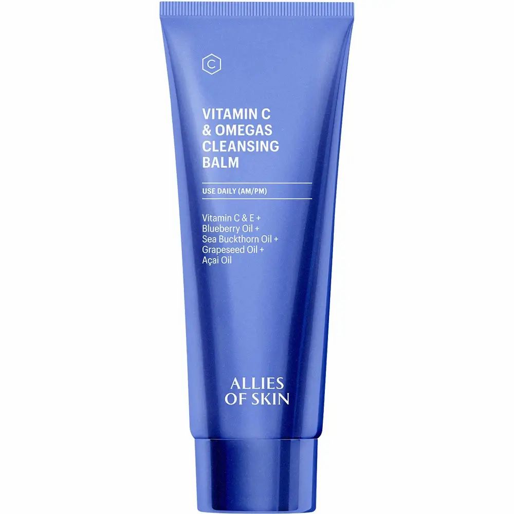 Tubo blu con 'Vitamin C & Omegas Cleansing Balm'. Contiene olio di mirtillo e acai. Marchio: ALLIES OF SKIN.