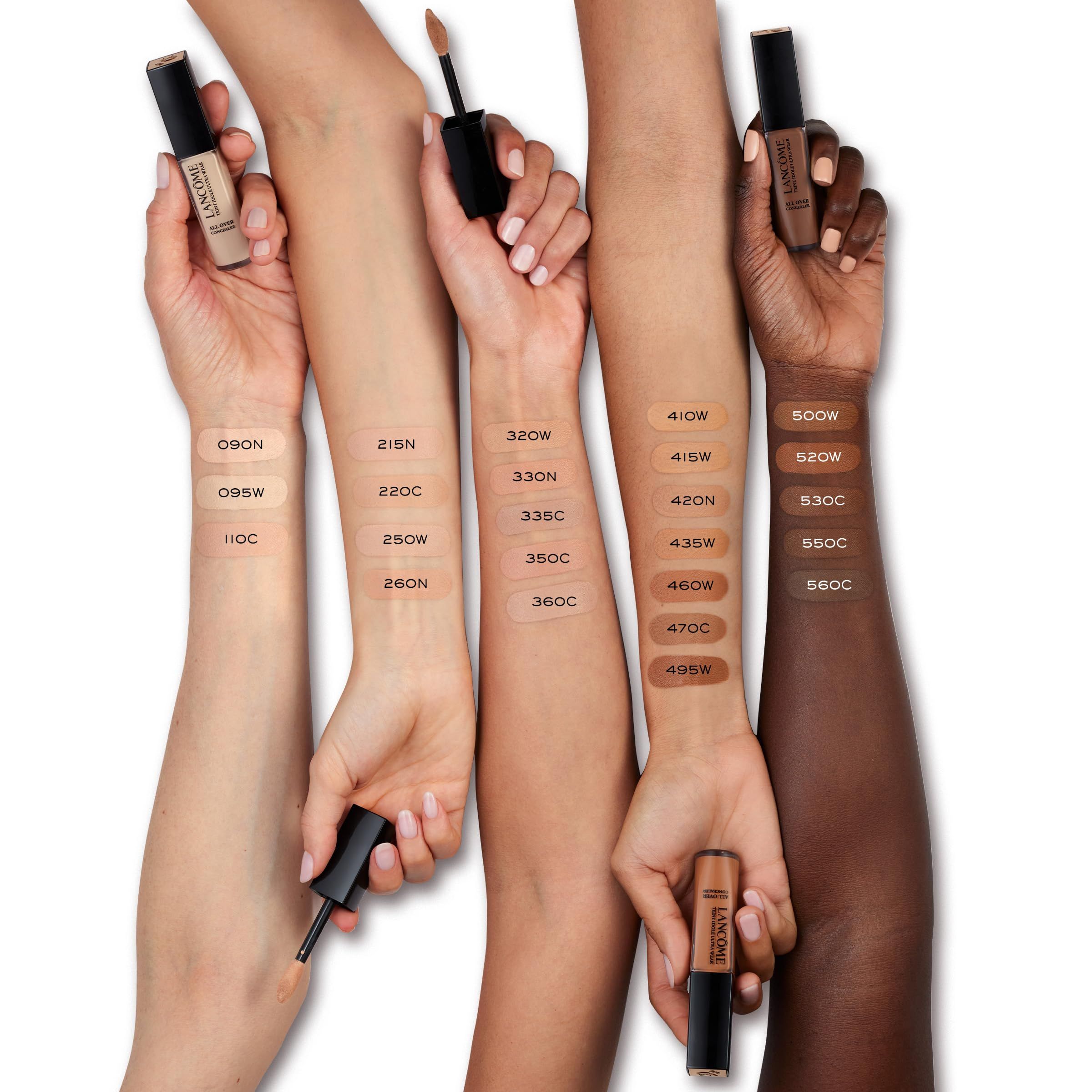 Mani con Lancôme Teint Idole Ultra Wear Concealer. Diverse tonalità di pelle. Numeri di colore sui braccia. Prodotto visibile.