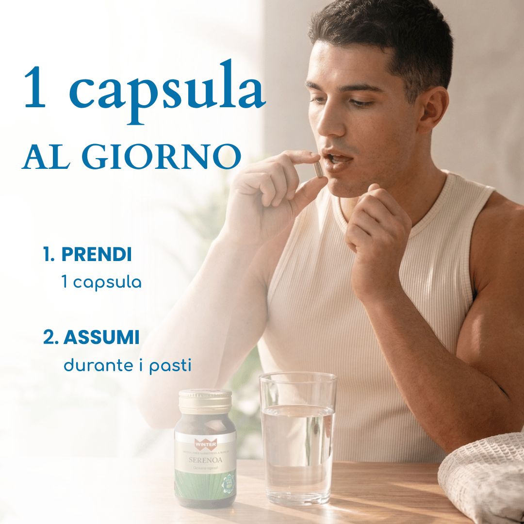 Uomo che assume una capsula di Winter Serenoa, bicchiere d'acqua.