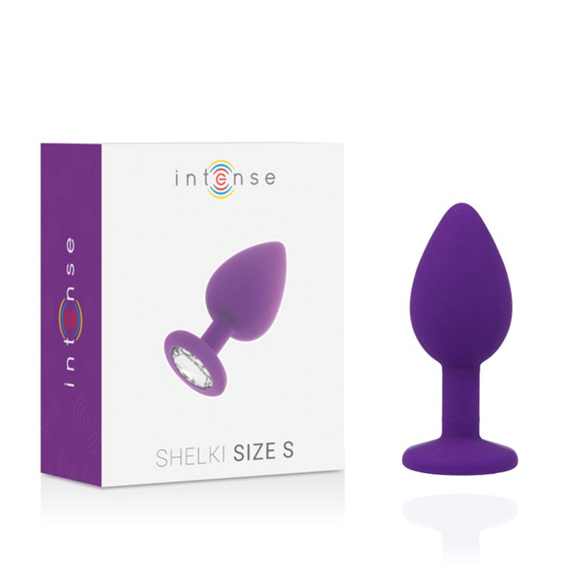 Plug anale viola e confezione. Plug con cristallo sulla flangia. La confezione mostra 'Shelki Size S'.