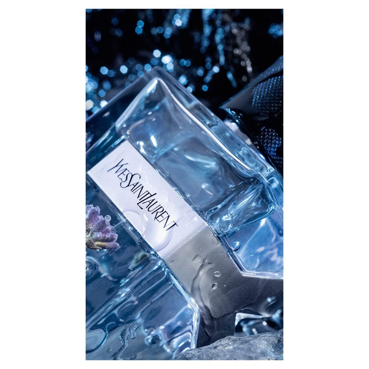 Yves Saint Laurent Y Men E.d.T. Vapo. Flacone in contesto blu. Logo Y argentato. Contenuto trasparente.